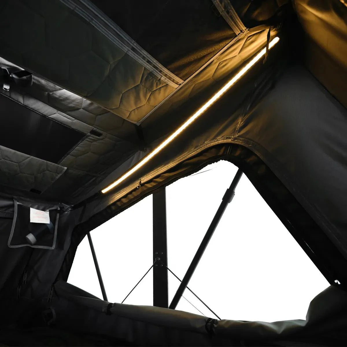 Large interior of OrthFrame Max RTT with integrated storage and high-density mattress