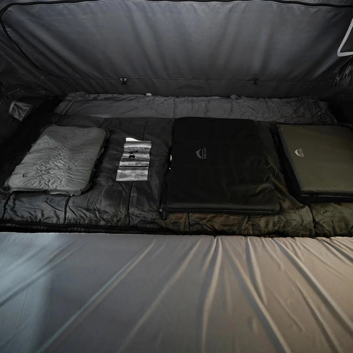 Large interior of OrthFrame Max RTT with integrated storage and high-density mattress