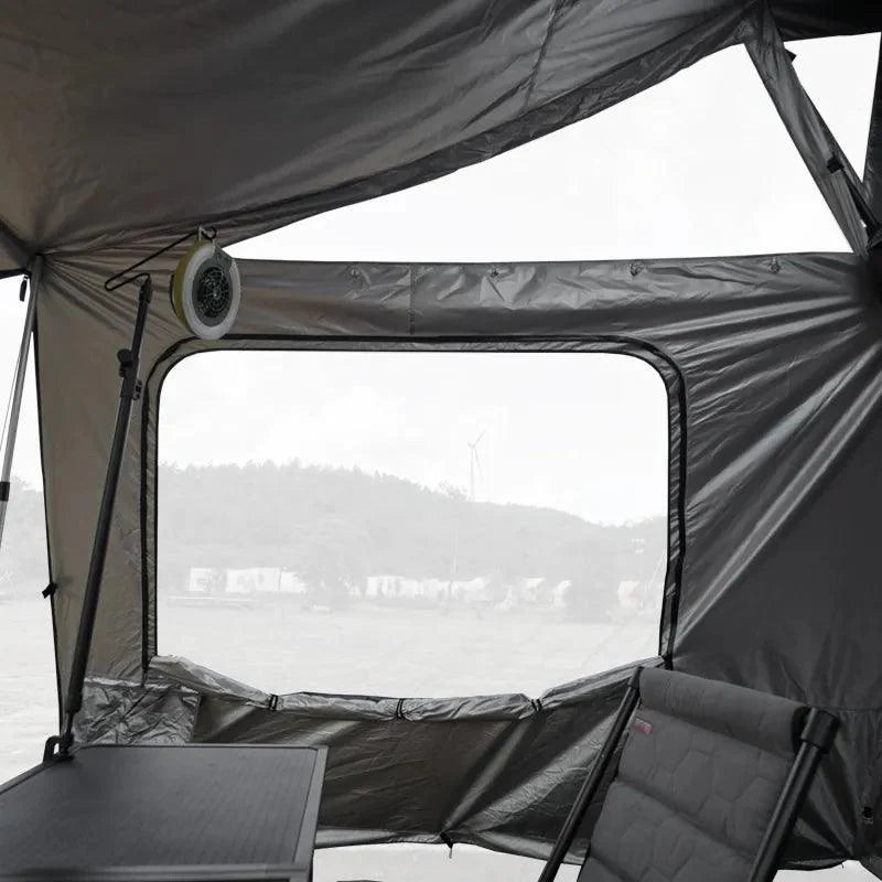Entrance detail of OrthFrame awning annex with heavy-duty zippers and mesh